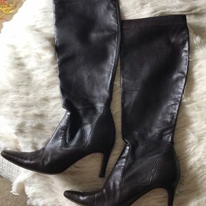 Brown leather Cole Han boots.